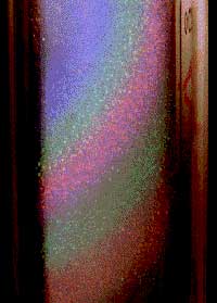 Photo shows diffraction pattern from a colloidal crystal made from polymethl methacrylate spheres index matched to the solvent.