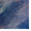 Photo description: Wildfires in the hills north and northwest of Los Angeles.
