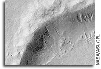 Melting Snow Seen as Cause of Martian Gullies