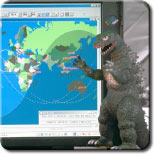 IMAGE: Station computer and Godzilla