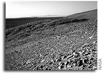 Rocks Tell Stories in Reports of NASA's Spirit Rover's First 90 Martian Days