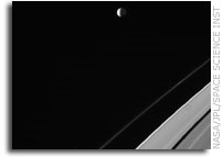 NASA Cassini Image: Mimas and Saturn's Rings