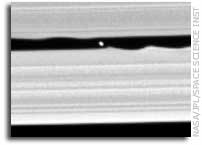 Cassini Finds New Saturn Moon That Makes Waves
