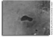 Cassini Reveals Lake-Like Feature on Titan