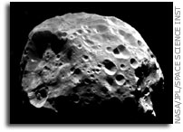 Scientists Discover Pluto Kin is a Member of Saturn Family