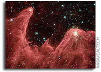 Spitzer Space Telescope Captures Cosmic Mountains of Creation�������