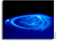 Solar Wind Whips up Auroral Storms on Jupiter and Saturn