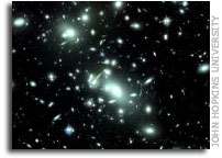 'Cosmic telescopes' may have found infant galaxies