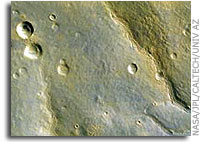 HiRISE Team Releases First Processed Images from NASA Mars Reconnaissance Orbiter's Powerful New Camera