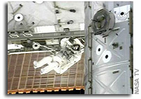 Crew Completes Truss Installation, First Spacewalk