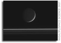 Crescent Enceladus and Saturn's Rings