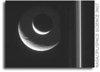 Enceladus Transits the Face of Another Moon