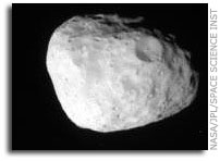 Janus and Saturn's Rings