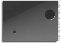 Moons Reach Sunrise Over Saturn