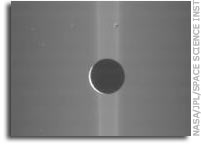 Rhea and Saturn's Rings