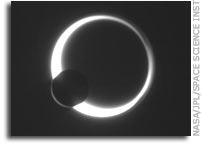 NASA Cassini Image: Rhea Eclipses Titan