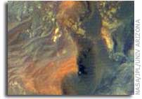 NASA Orbiter Reveals New Details of Mars, Young and Old