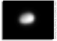NASA Cassini Image: Saturn's New Moon Polydeuces
