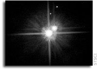 New Hubble Images Show Similar Colors for Pluto's Moons