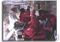Shuttle Crew Strapped In and Ready To Go