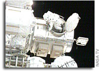 Astronauts Conducting STS-118's Fourth Spacewalk