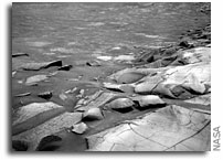  Opportunity Peers Beneath Surface of 
