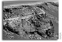 Opportunity Studies Rocks Representative of Crater Wall