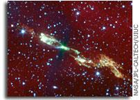 Spitzer Sees An Embryonic Stare With Jets Flaring