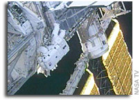 International Space Station Spacewalkers Find No Solar Wing Smoking Gun