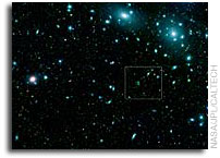 Spitzer nets thousands of galaxies in a giant cluster