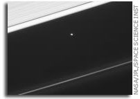 Atlas and Saturn's Rings
