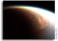NASA Cassini finds cloud engulfing Titan's North Pole