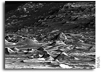 Mars Reconnaissance Orbiter Examines 'Lace' and 'Lizard Skin' Terrain