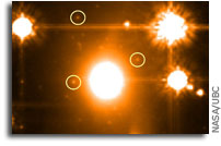 Astronomers find the most distant star clusters hidden behind a nearby cluster