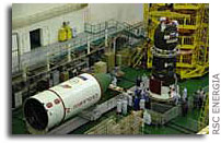 Progress M-62 transport cargo vehicle docked with transfer compartment
