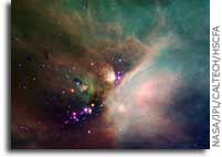 Spitzer Catches Young Stars in Their Baby Blanket of Dust