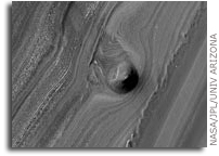NASA's Mars Reconnaissance Orbiter sees Unusual Mound in North Polar Layered Deposits