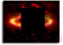 Red Dust in Planet-Forming Disk May Harbor Precursors to Life