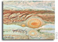 Three Red Spots Mix it Up on Jupiter