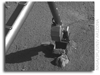 NASA's Phoenix Mars Lander Extending Trench