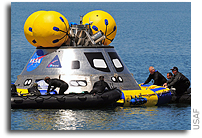 Pararescuemen conduct water test of new NASA capsule
