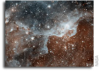NASA'S Spitzer Sees The Cosmos Through 'Warm' Infrared Eyes