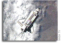 Discovery Arrives at International Space Station