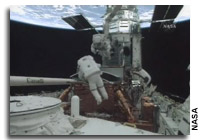 Astronauts Complete First Hubble Servicing Mission Spacewalk