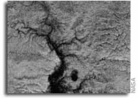 Valleys on Titan Show North-South Contrast