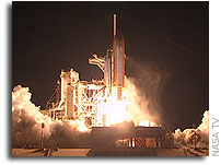 NASA'S Shuttle Discovery Heads to Station After Predawn Launch