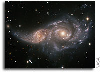 Massive Black Holes 'Switch On' in Galaxy Collisions