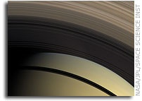 Cassini Shows Saturnian Roller Derby, Strange Weather