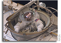 Photo: Entering the Space Station After a Long EVA