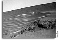 Mars Rover Opportunity to Stop and Study Rocks (with photos)